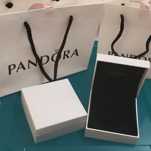 Two pandora bags and two pandora bracelet boxes (empty)